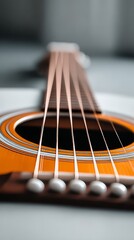 Fototapeta premium Warm Acoustic Guitar, detailed and melodious, representing music and craftsmanship with a shallow depth of field