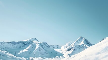 Fototapeta premium Minimalist Snowy Mountain Peaks under Clear Blue Sky with Wide Negative Space