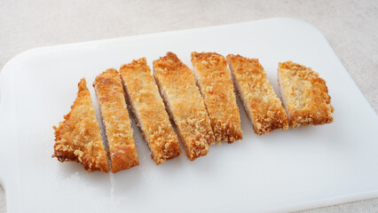 Deep fried cutlet chicken katsu, Japanese food on white background.