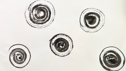 Ink-drawn water ripples, ripples painted with ink and brush, ink wash painting of ripples, round swirl