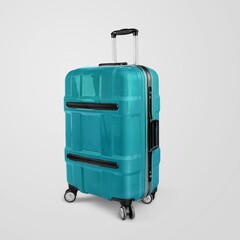 Light blue travel suitcase on light background