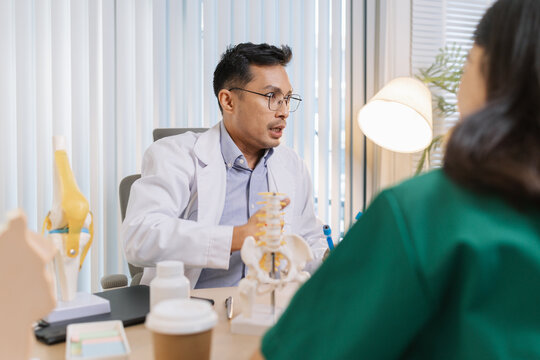 Group of doctors and nurses consulting about a complex patient case in hospital office. Team analyzing medical data and discussing diagnostic plans for accurate and efficient treatment.