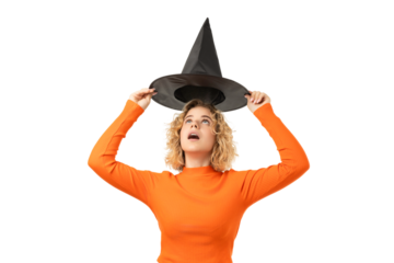 Woman shows excitement while holding a witch hat, isolated, PNG