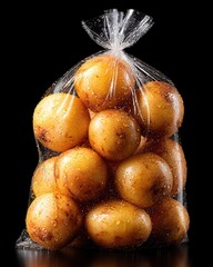 Fresh Potatoes in Clear Plastic Bag with Water Drops