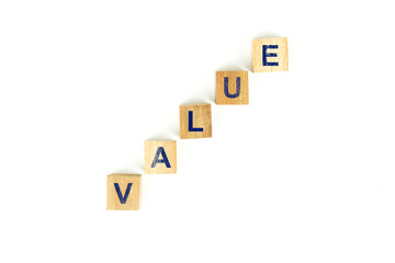 Value spelled out with wooden blocks on a white background.