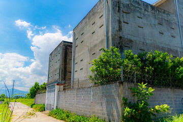 Special agricultural buildings for swallows.

The buildings are designed for mining swallows' nests. It's an expensive delicacy in Asia. 
