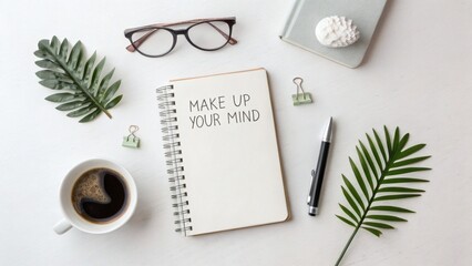 Make up your mind concept flat lay with coffee notebook pen and glasses on white desk top