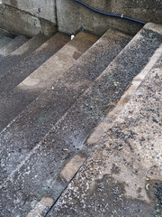 Close-up of wet stairs near the harbor