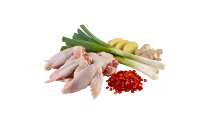 Fresh chicken wings ready for a vibrant Asian stir-fry with ginger, spring onions, and spicy chili peppers, a culinary adventure awaits your kitchen