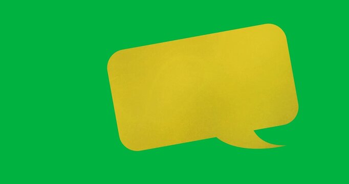 Digital animation of yellow blank speech bubble with copy space against black background