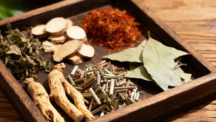 traditional Chinese herbal medicine displayed on wooden tray with dried plants, roots and leaves, natural healing, holistic health, wellness concept, apothecary style.Generated by AI