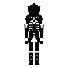 Iconic black silhouette of a traditional nutcracker soldier standing tall symbolizing holidays and christmas