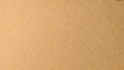 Abstract brown recycled paper background. Brown background, kraft paper texture, design space.
