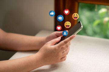 The concept of living on vacation and playing social media. Social media and digital online concept, man using smart phone with Social media. Social Distancing ,Working From Home concept.