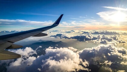 Obraz premium Aircraft wing and cloudscape viewed from a passenger seat