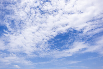 clear blue sky background,clouds with background, Blue sky background with tiny clouds. White fluffy clouds in the blue sky. 