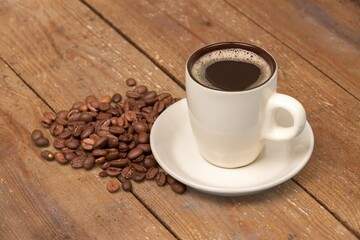 cup of tasty hot americano coffee on desk