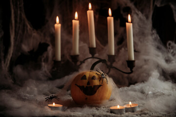 Halloween composition with Jack o`lantern on black grunge background