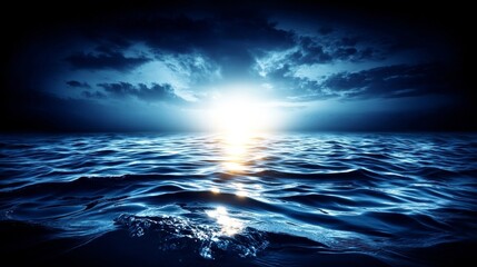 Obraz premium Expansive ocean scene at dusk or dawn with shimmering reflections on gentle waves, low light conditions,