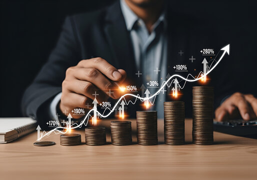 Businessman analyzing financial growth with coins and upward trend graph on desk