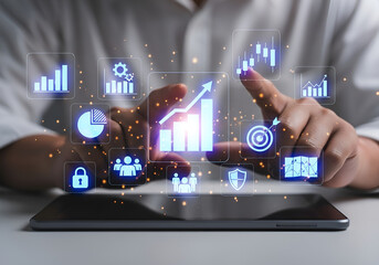 Business professional analyzing digital data and financial growth metrics on tablet with holographic interface