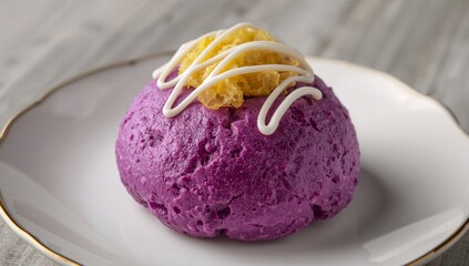 A beautifully plated purple yam dessert with a creamy yellow topping