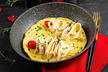 Omelette with pita bread and cheese in the shape of a Christmas tree. Healthy breakfast.