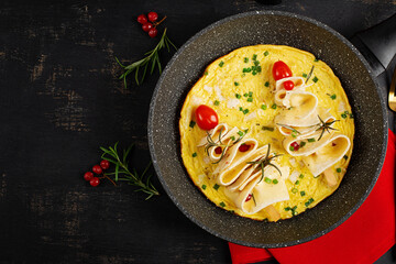 Omelette with pita bread and cheese in the shape of a Christmas tree. Healthy breakfast. Top view.