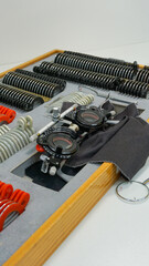 Close-up of a trial lens set with trial frame used for eye exams in optometry, showing various...