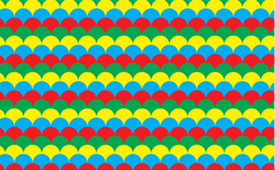 Bright seamless geometric vector texture in circles in red, green, blue and yellow colors
