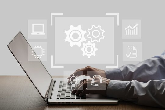 Robotic process automation, artificial intelligence concept. Man use laptop - Powered by Adobe