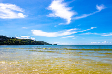 Patong Beach Phuket with turquoise blue water white sand Thailand.