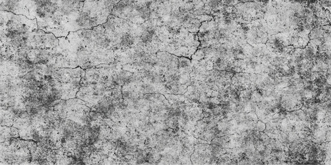 The gray, rough stone wall surface features an old grunge texture and rock pattern, ideal for an architectural background or wallpaper design