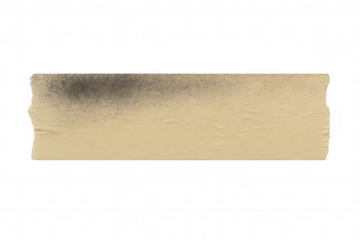 Beige aged masking tape strip featuring a dark spray paint detail, creating a grunge and distressed appearance. Isolated on transparent