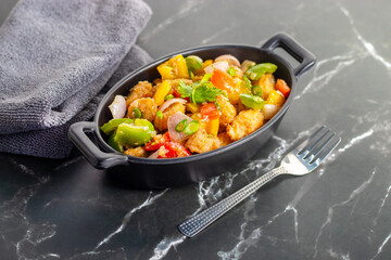 Baby corn stir fry is a colorful, crunchy, and healthy dish sautéed with bell peppers, carrots, garlic, soy sauce, and aromatic spices.

