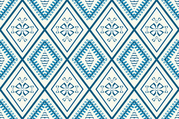 Seamless geometric blue diamond pattern inspired by traditional Thai textiles. Elegant ethnic vector design suitable for fabric prints, wallpapers, wrapping papers, and background decoration.