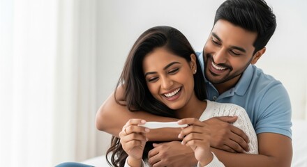 Joyful Indian Couple Celebrating Positive Pregnancy Test Result