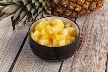 Sweet canned pineapple fruit pieces