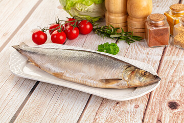 Raw whole salted herring fish