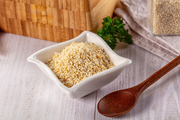 Raw dry sesame seeds heap