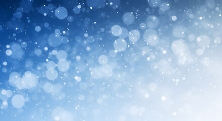Abstract blue-toned background with bokeh effects and delicate white particles