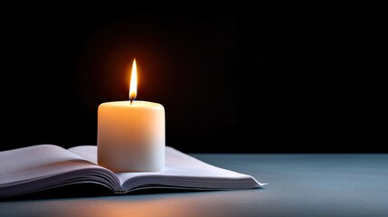 Candle Burning on Open Book in Dim Light Creating a Calm and Serene Atmosphere for Relaxation and Reflection