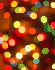 Abstract bokeh image with colorful blurred lights, warm tones, and a festive ambiance