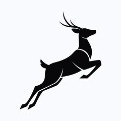 Leaping deer in mid air a striking black and white silhouette