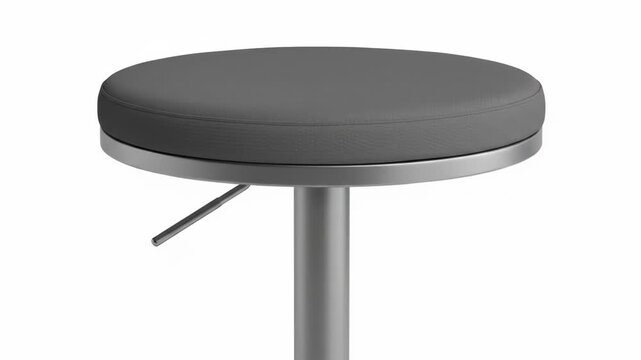 Gray-padded, round stool atop a silver cylinder stem against white