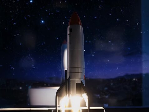 A rocket blasts off from a laptop screen against a window view of a star-filled night