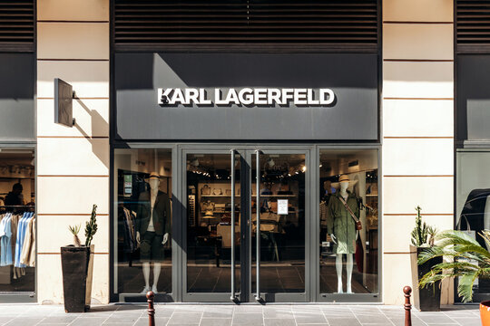 Nice, France - June 9, 2025: Karl Lagerfeld boutique storefront with mannequins and fashion displays on a sunny day in Nice, France