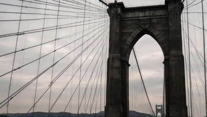 Fototapeta premium Brooklyn Bridge Arch and Cables on Overcast Day.