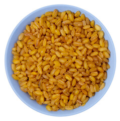 Isolated Bulgur in a blue saucer on a white background. Top view