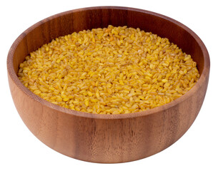Isolated Bulgur in a wooden bowl on a white background. Side view